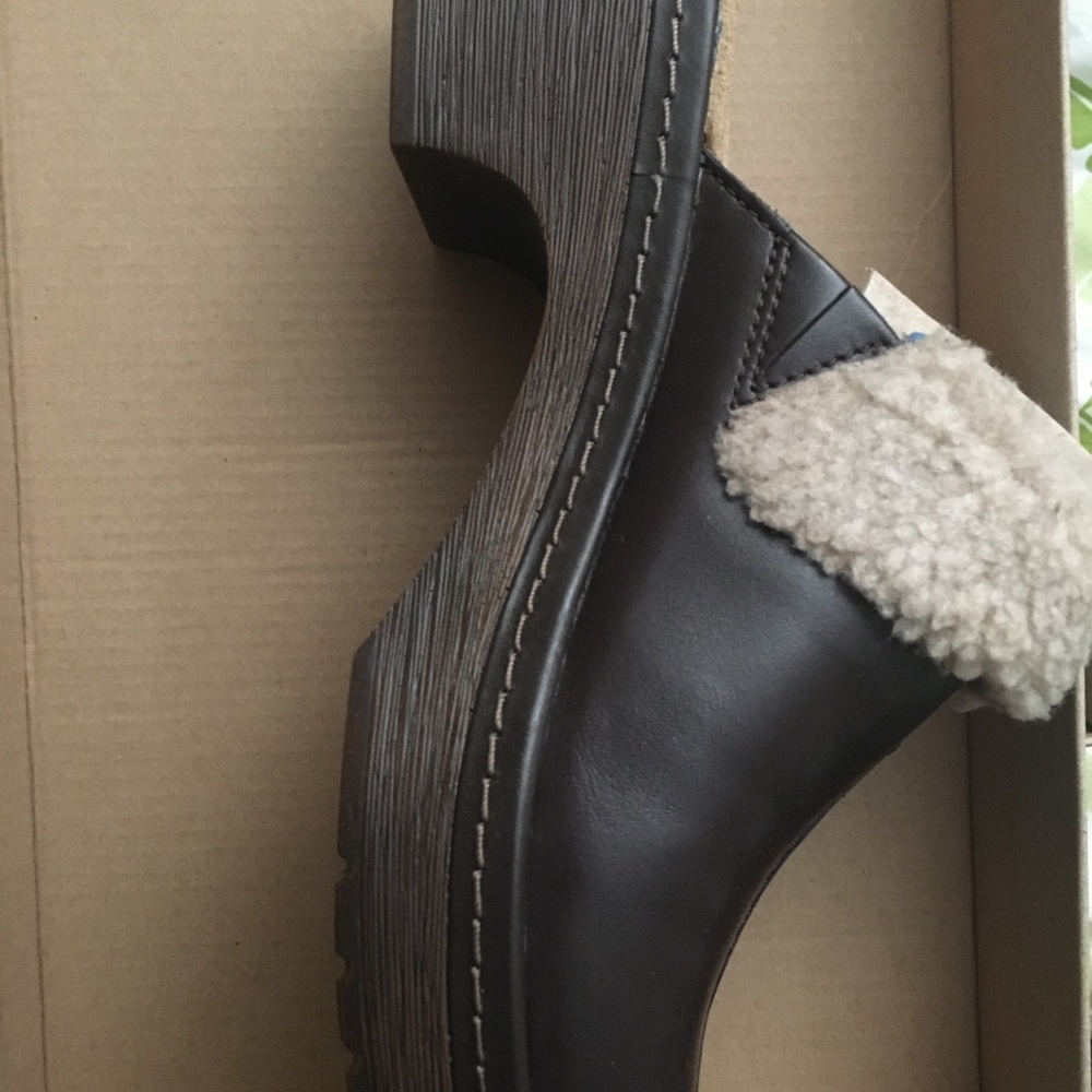 Brown leather clogs